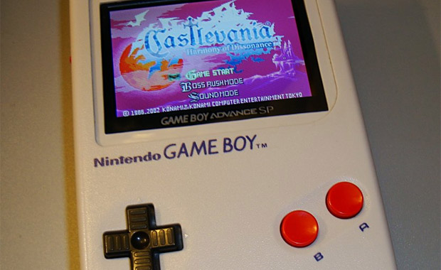 A Game Boy that plays GBA games running Castlevania: Harmony of Dissonance