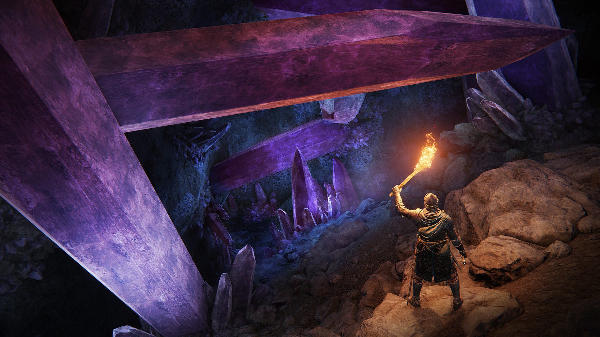 Exploration of a crystal cave lit by torches