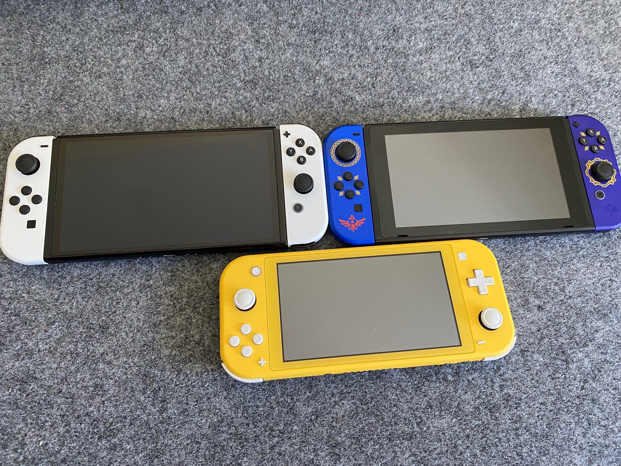 Nintendo Switch OLED review: original Switch, Switch Lite, and OLED side by side