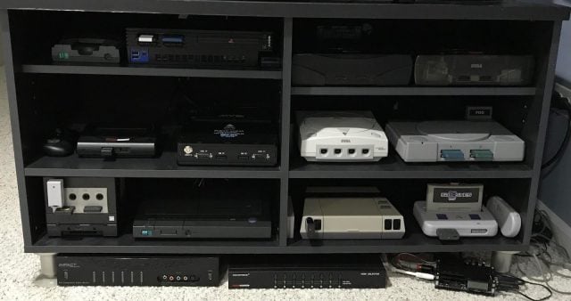 Retro video game consoles in an entertainment center