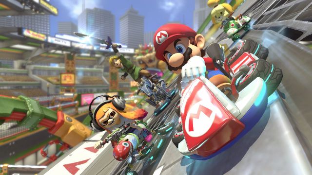 Mario, Inkling, Link, and Isabelle race in floating karts.