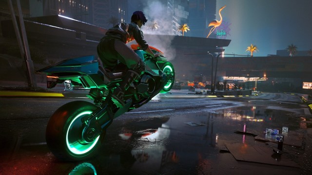 Cyberpunk 2077: V riding a motorcycle that has neon green lights on the wheels.