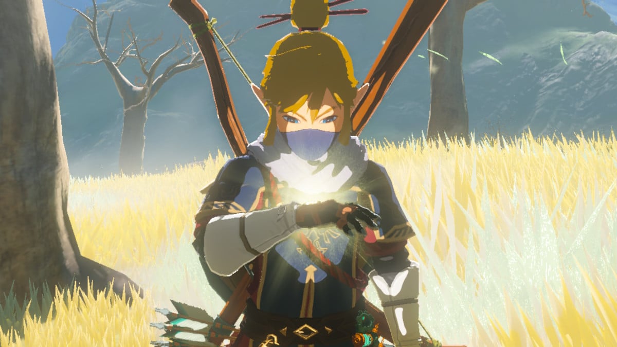 Link staring at his glowing hand in The Legend of Zelda: Tears of the Kingdom.