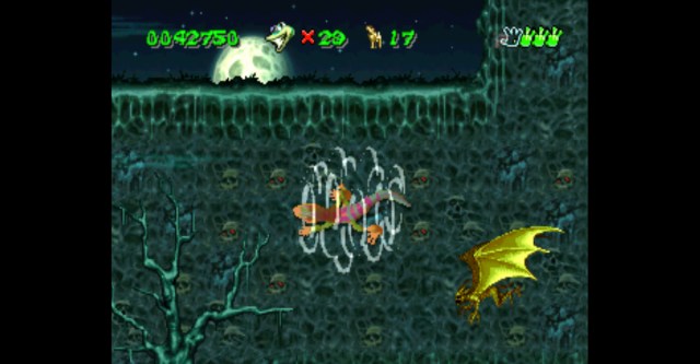 Gex Graveyard level with several powerups