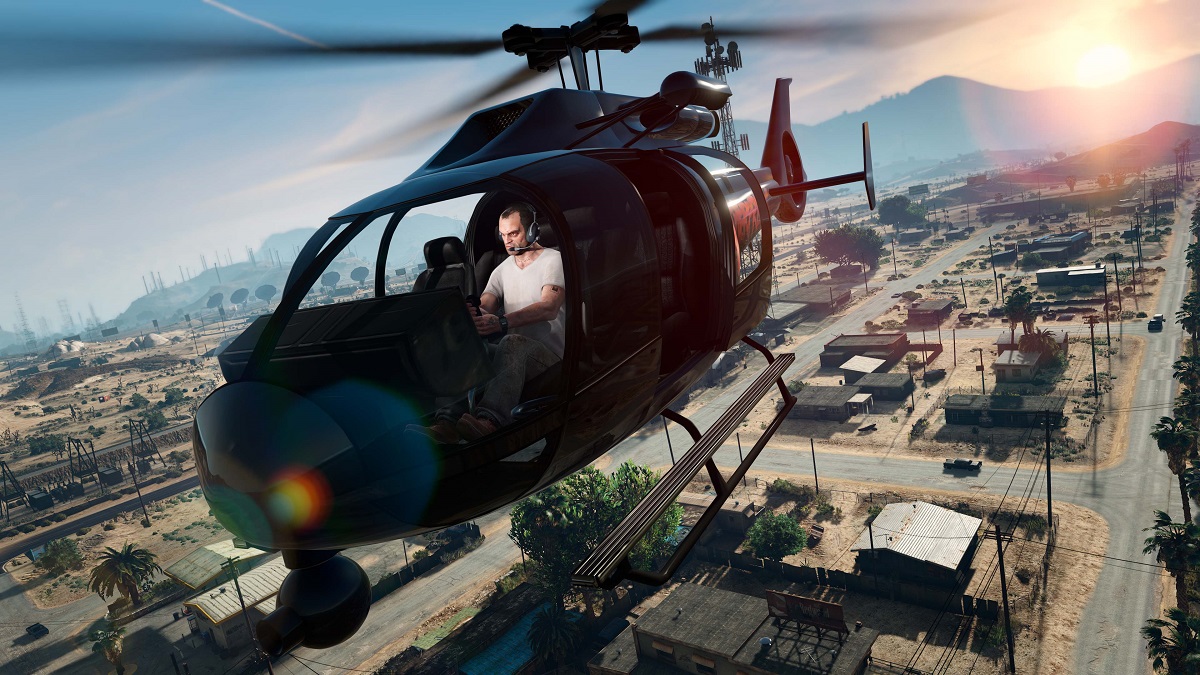 Grand Theft Auto 5: Trevor flying a helicopter over Los Santos