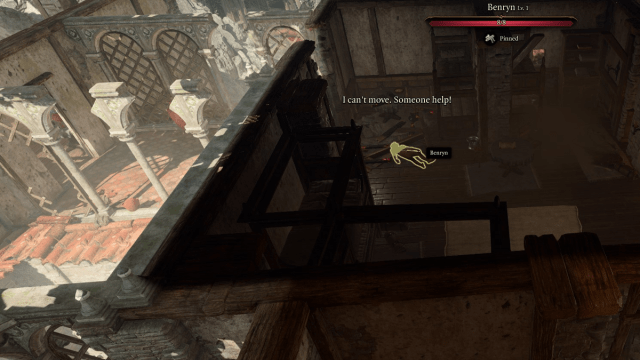 The guy you're looking to save in BG3 is pinned under some rubble, he's pictured here just by the door. 