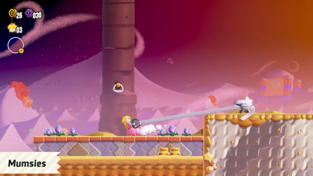 Peach pulling Mumsies in Super Mario Wonder