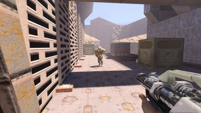Quake 2 RTX: Der Spieler ist dabei, eine Super-Schrotflinte auf einen Wachmann abzufeuern.