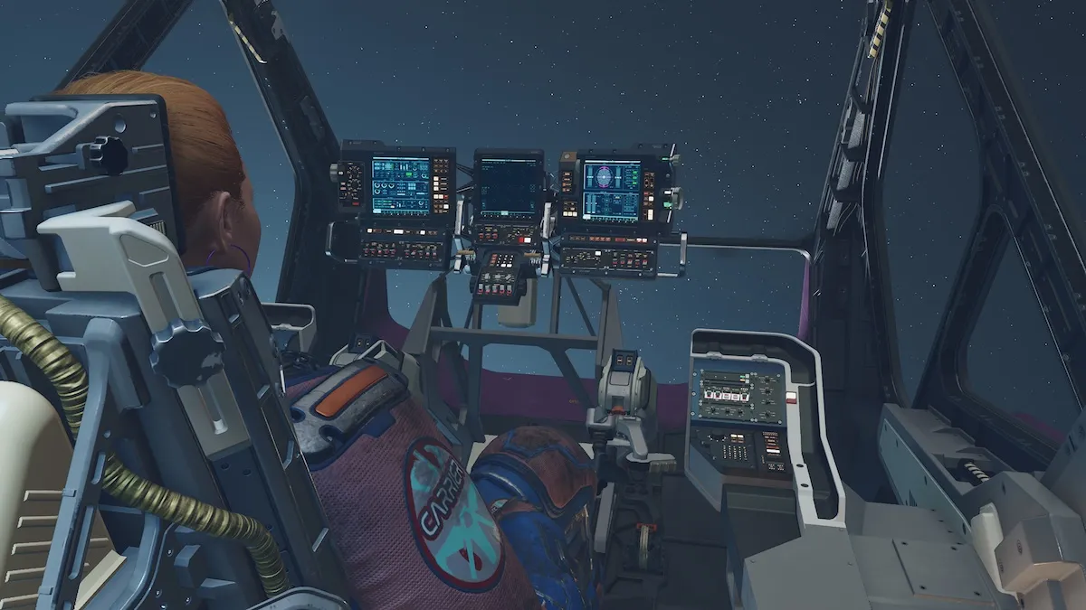 Protagonist in spaceship cockpit in Starfield.