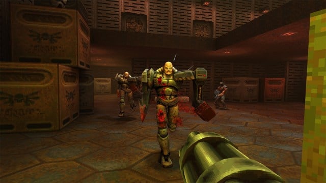 Quake 2: the player about to fire at some Stroggs in a warehouse.