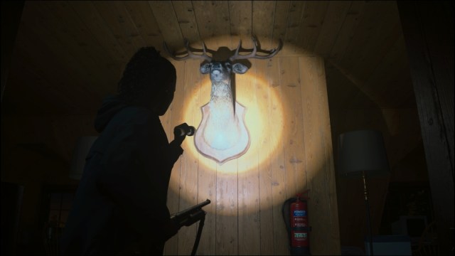 Deer head in Ranger's Cabin in Alan Wake 2.