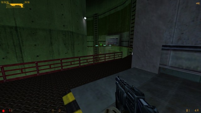 Half-Life: Gordon Freeman holds a shotgun in a large, glowing green room.