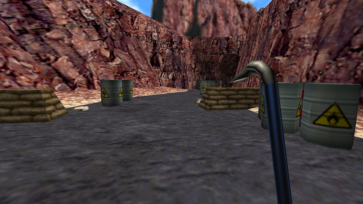 Half-Life: a screenshot showing the outside world and Gordon holding a blue crowbar.
