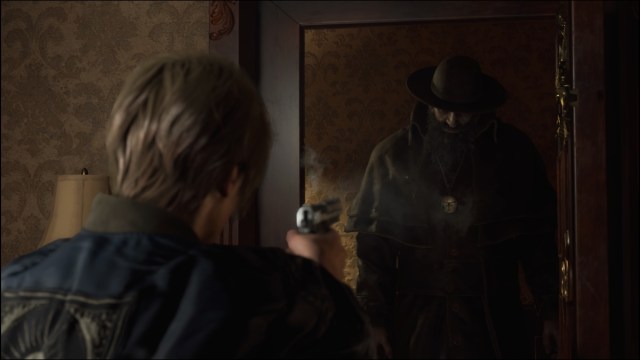 Leon Kennedy holding gun in Resident Evil 4 Remake.