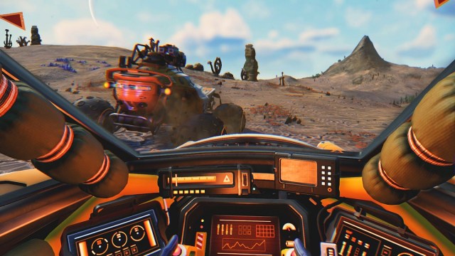 No Man's Sky: the inside of a vehicle as it drives across a rocky planet.