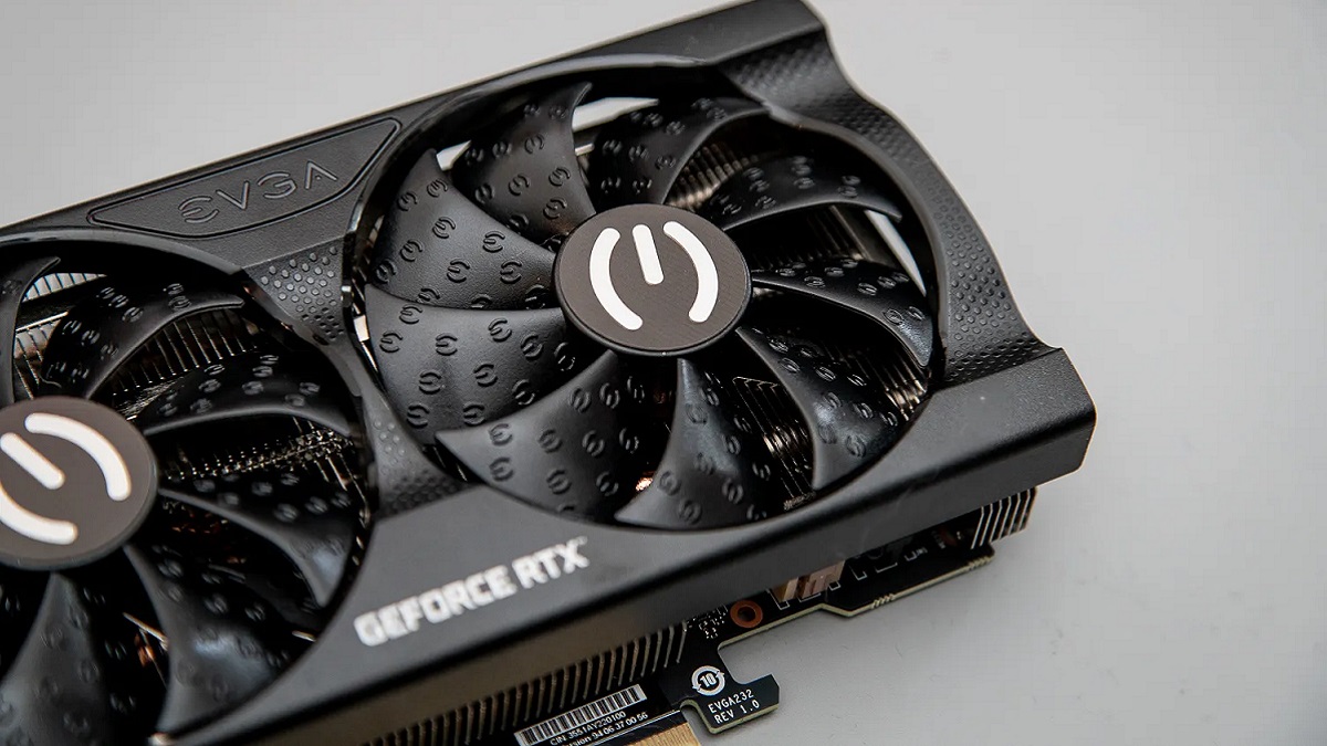 Close-up photo of an Nvidia RTX 3050 graphics card on a gray background.