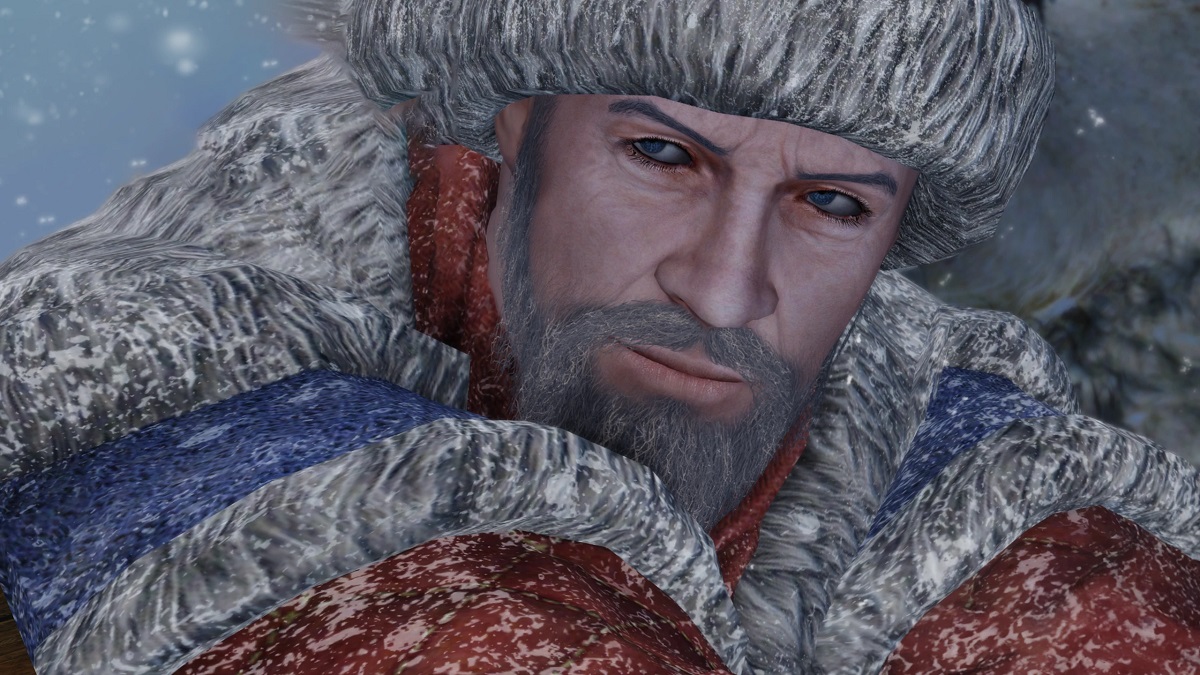 Skyrim: a close-up of a trader with a large beard and red, Christmas-looking clothes.