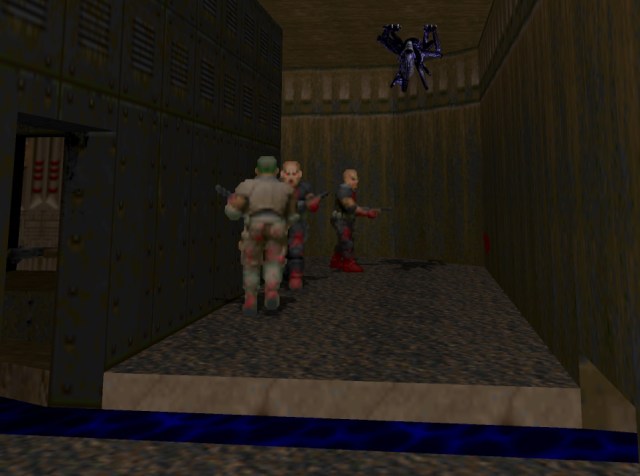 Doom 2 monsters walking around with an Aliens Xenomorph on the roof.