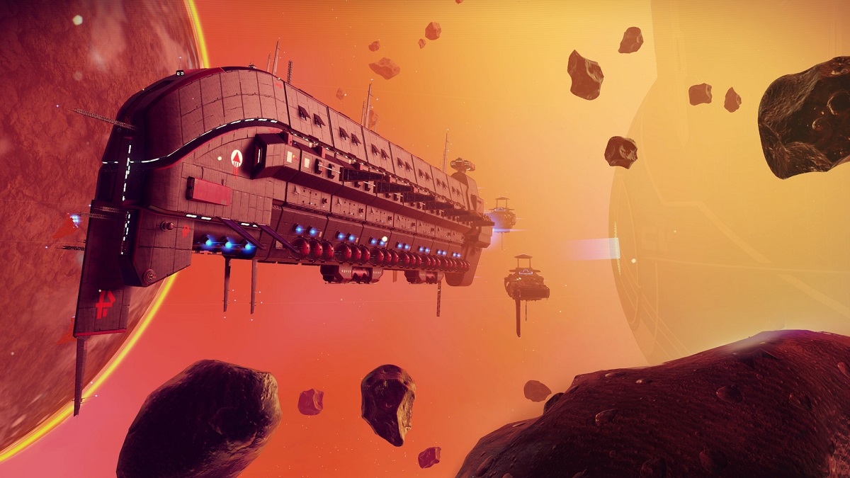 No Man's Sky: a freighter bathed in orange hovers near a dark planet.