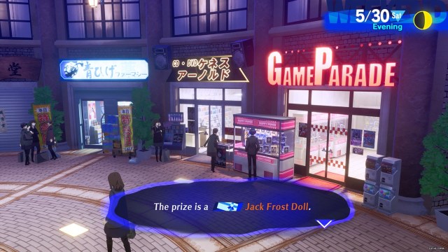 The Game Parade Store in Persona 3 Reload, with the Jack Frost Doll sitting right outside near the arcade claw machine. 