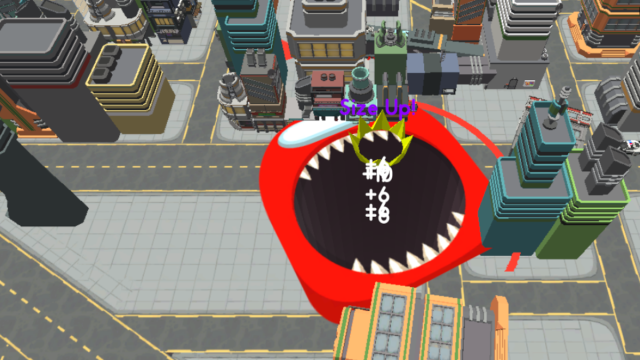 Hole.IO gameplay, with the massive hole opening up underneath a city block