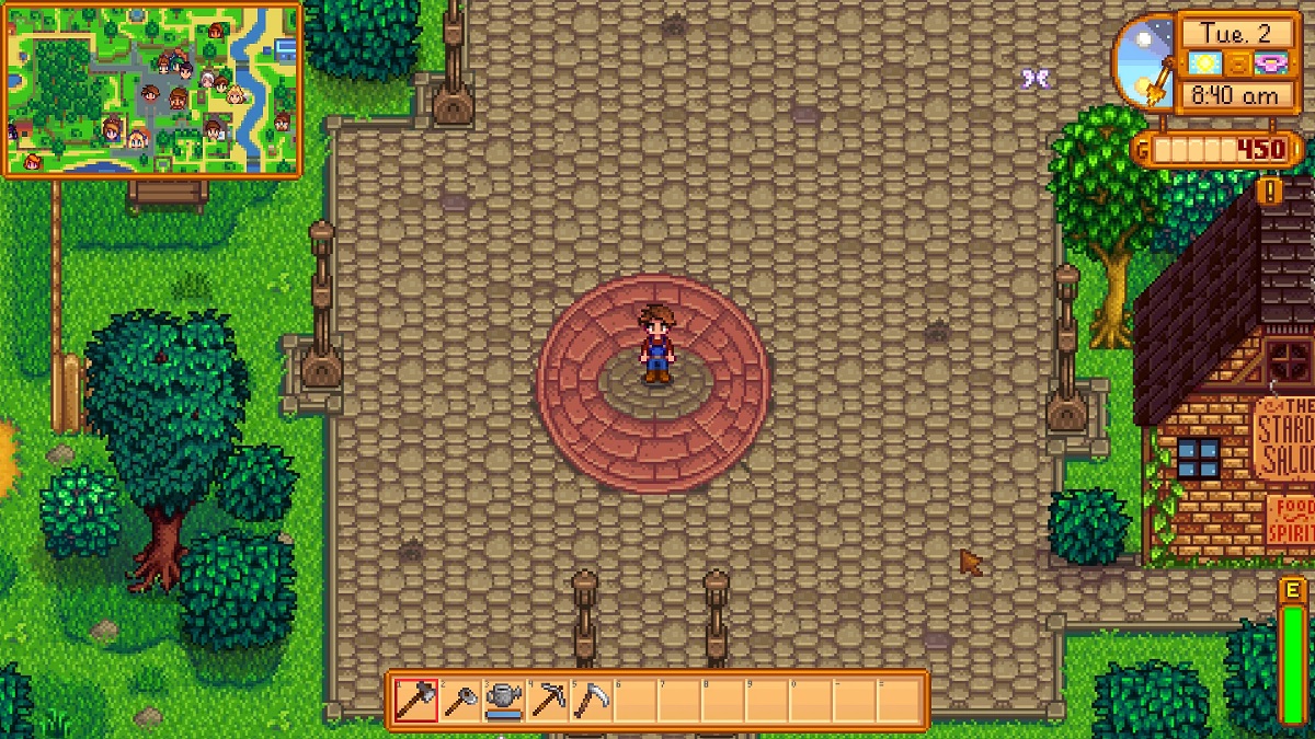 Stardew Valley: the player stood in the middle of the town square with a small NPC map in the left-hand corner.
