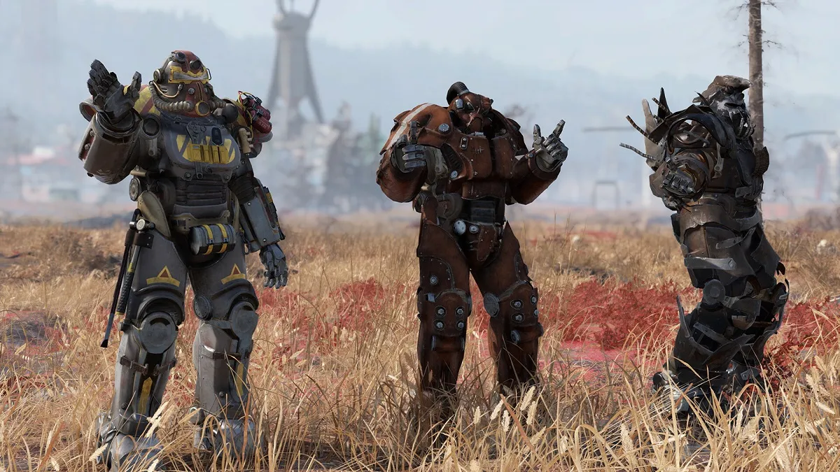Fallout 76: people in Brotherhood of Steel armor posing in a field.