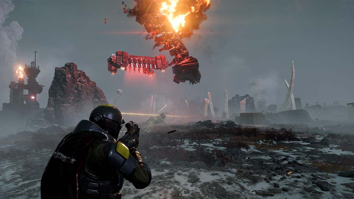 A Helldivers 2 player aiming down his weapon scope as Automatons drop out of a ship.