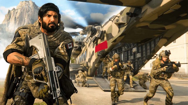 A Call of Duty character holding a gun, while other players run out of a helicopter.