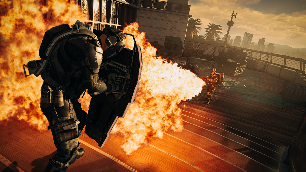 A flamethrower shooting at a player using a shield.
