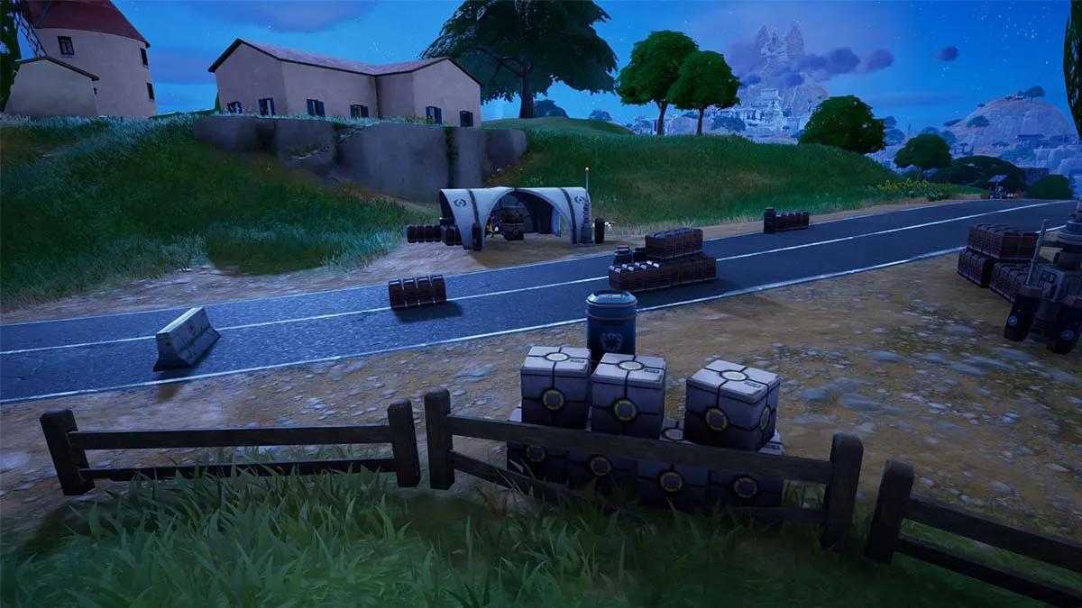 An Imperial Roadblock in Fortnite, with a small hut and crates.