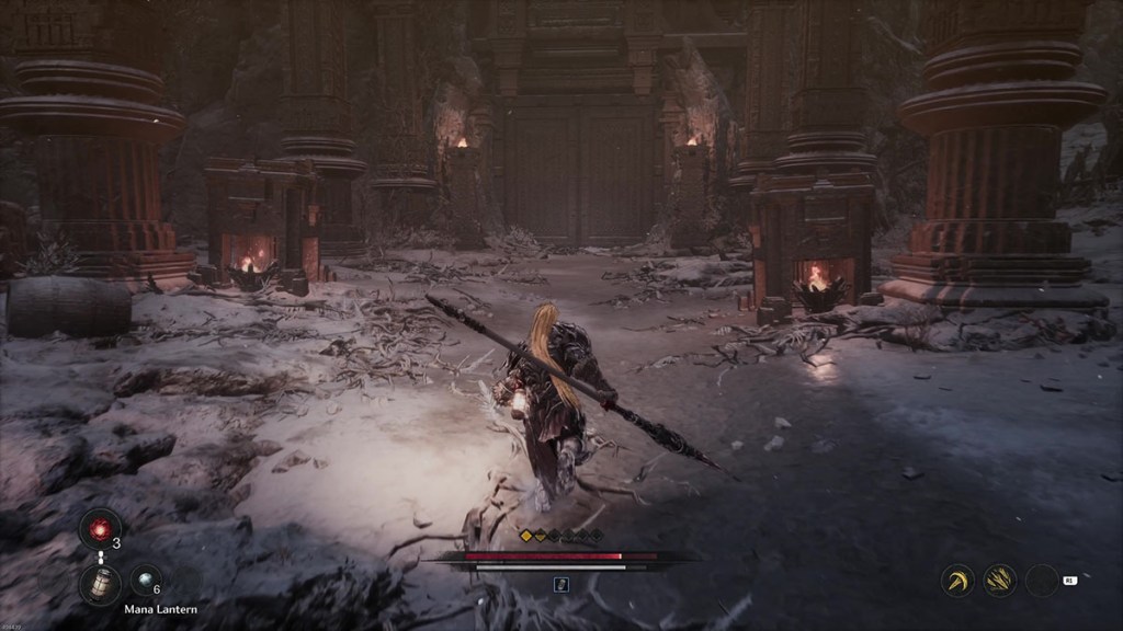 A large set of iron doors leading into a mountain keep