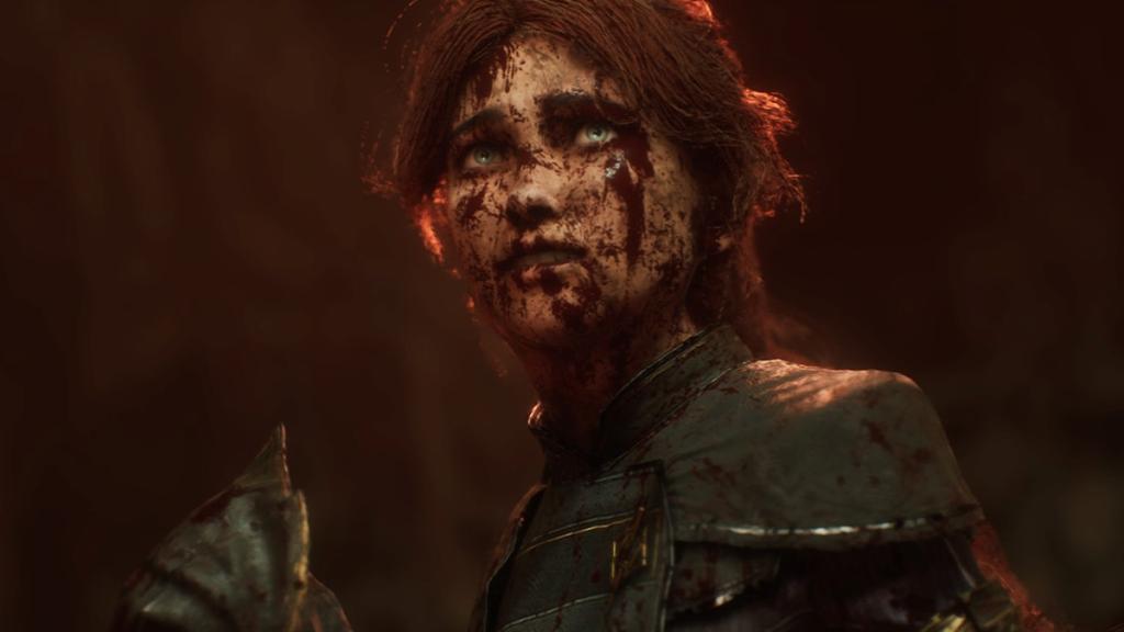 A woman covered in blood in Expedition 33. 