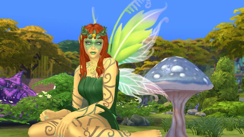 A fairy with orange hair, green wings, and a green dress sitting on grass next to a blue mushroom in the sims 4