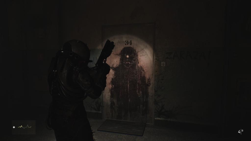 Looking at the monster graffiti on the apartment 34 door with Angela's sick mother residing it in