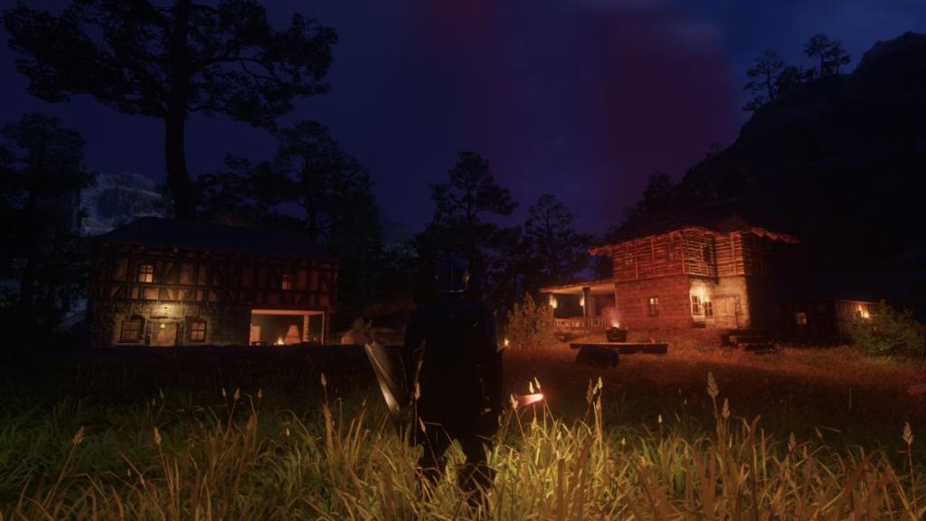 A player-built Enshrouded village at night.