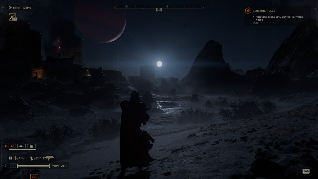 A night in a desert with the full moon shining over it in Helldivers 2.