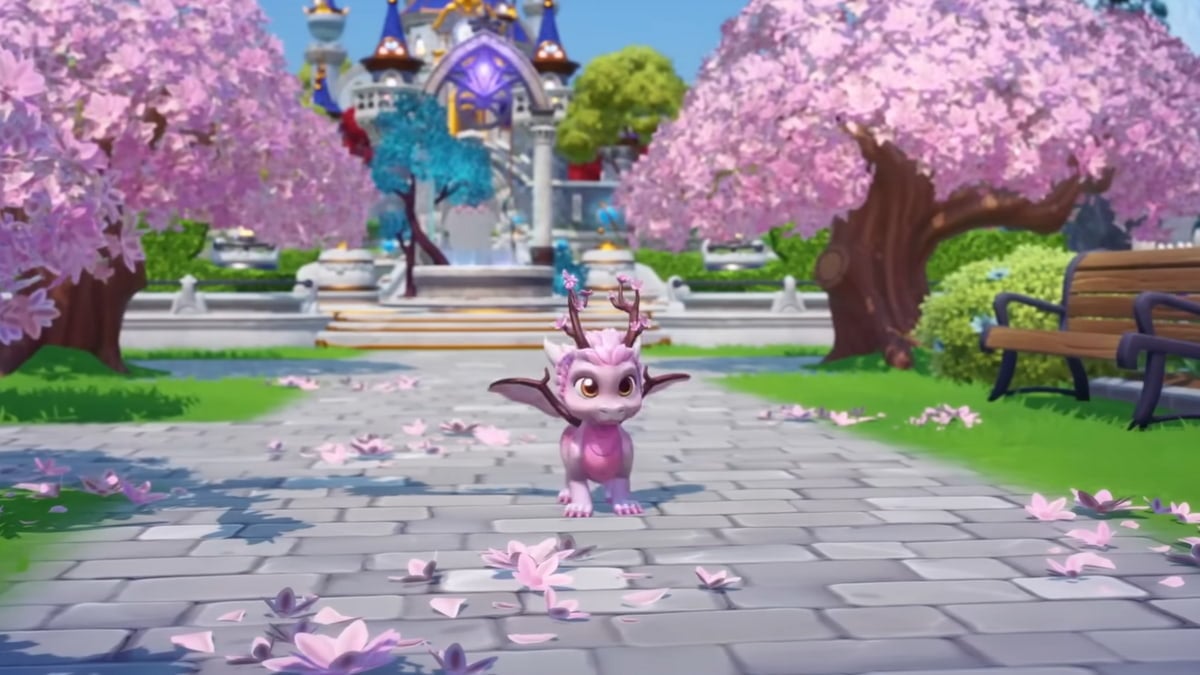 Sakura blossom dragon standing by cherry blossom trees in disney dreamlight valley