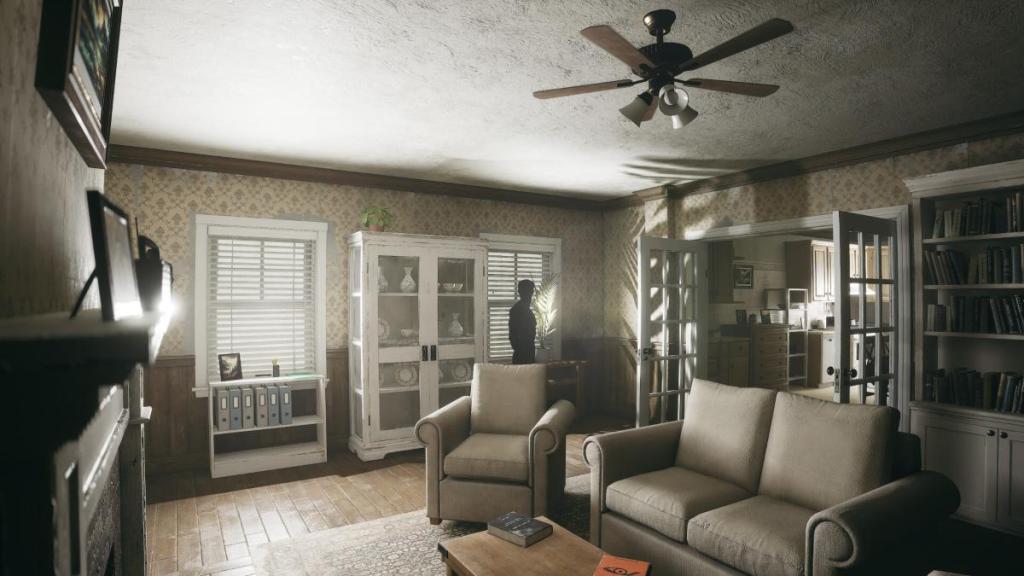 The living room in OBEY THE VOICE with a shadowy figure standing near the window