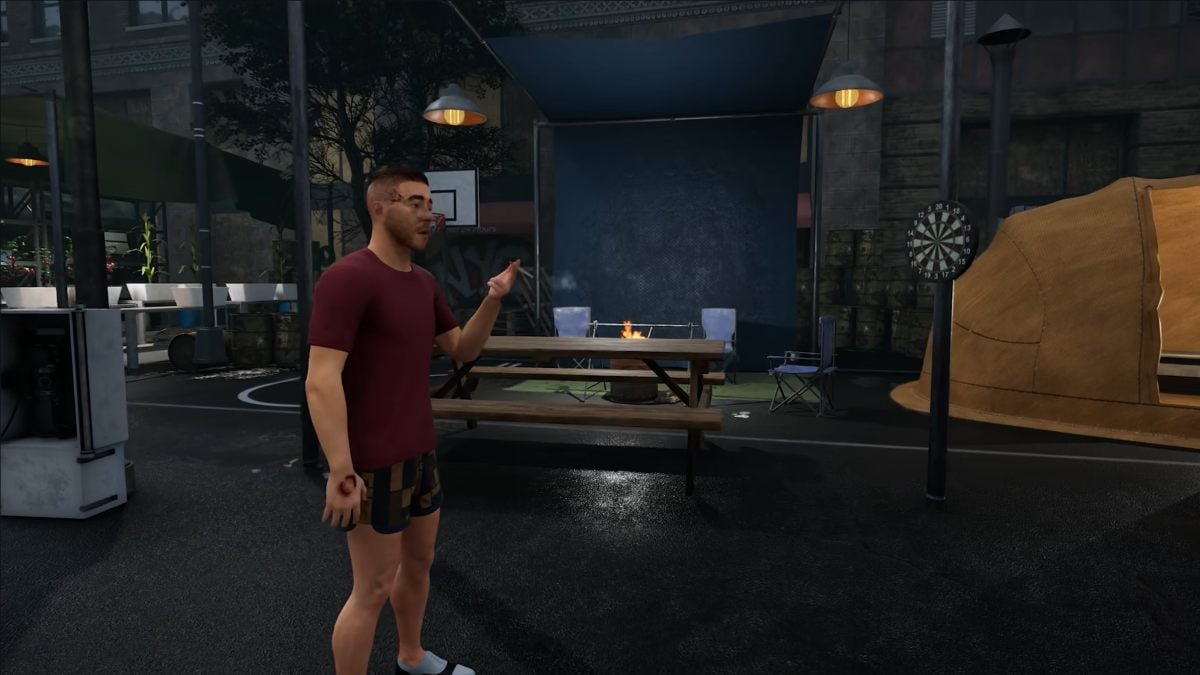 Man in red smoking inside the survivor block