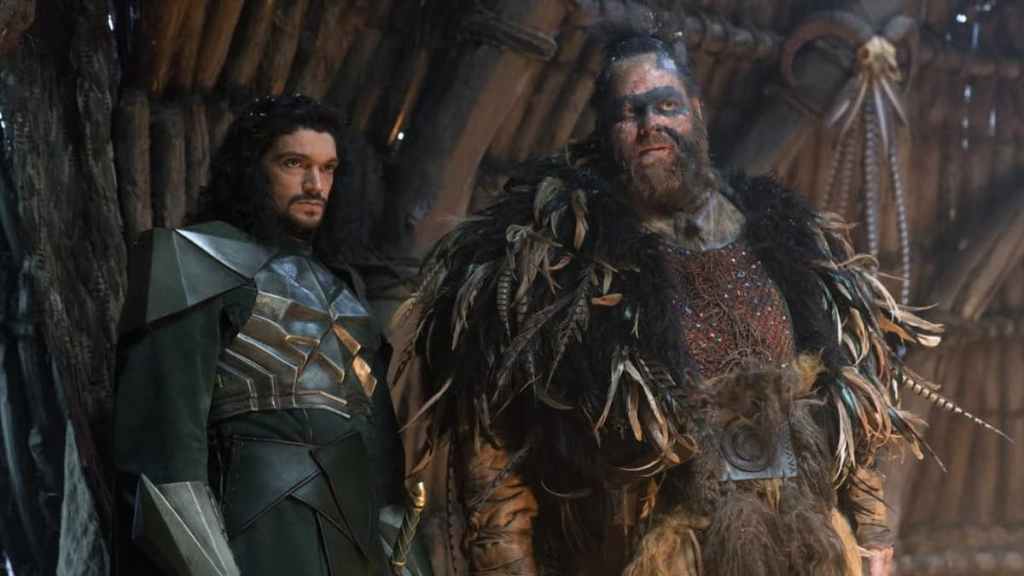 Ólafur Darri Ólafsson and another actor portraying characters in a movie. 