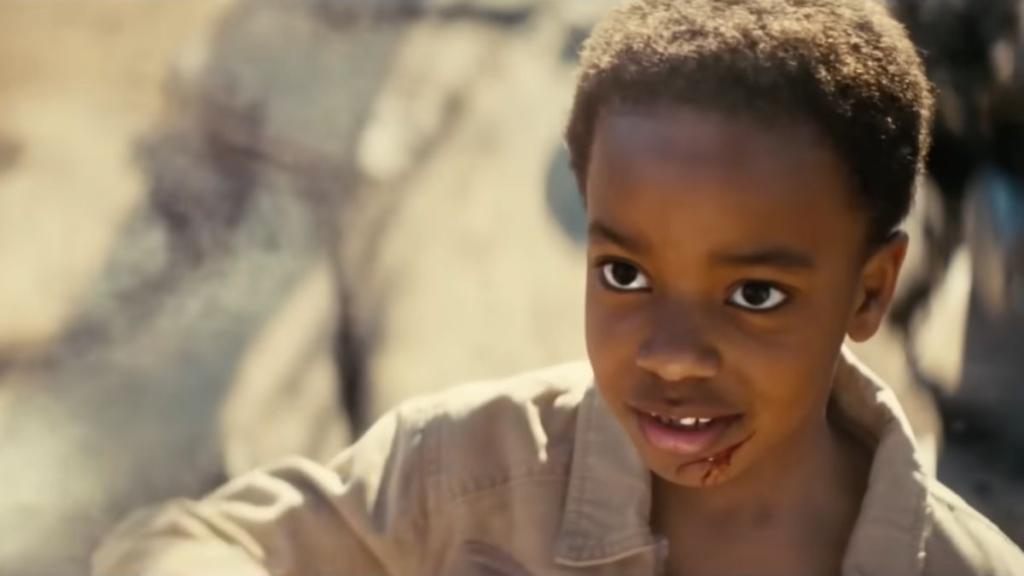 A young Max looking off-screen at a Knight after Shady Sands falls