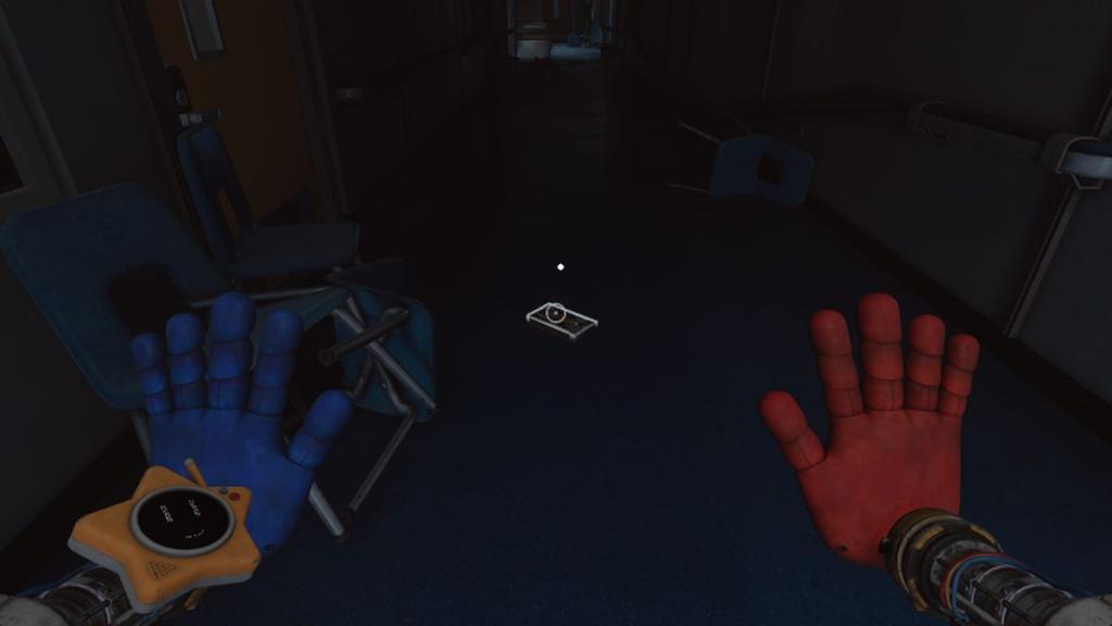 Blue tape on floor in dark and destroyed corridor