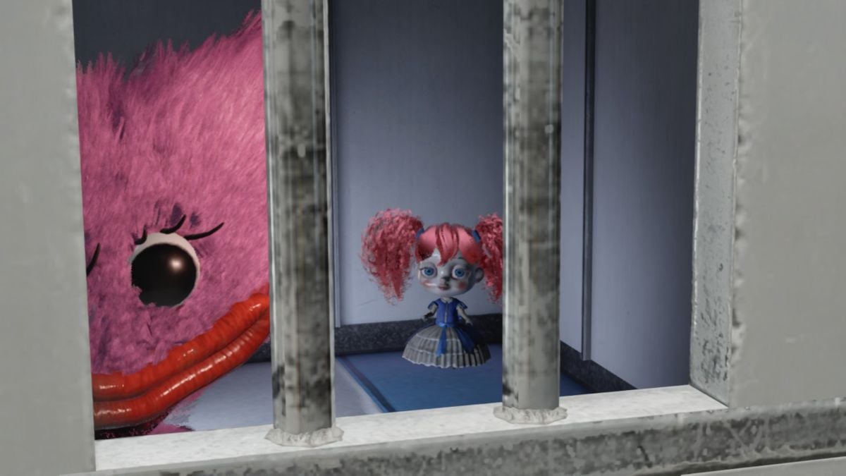 Looking through a grate on cell door at Poppy and Kissy Missy's face