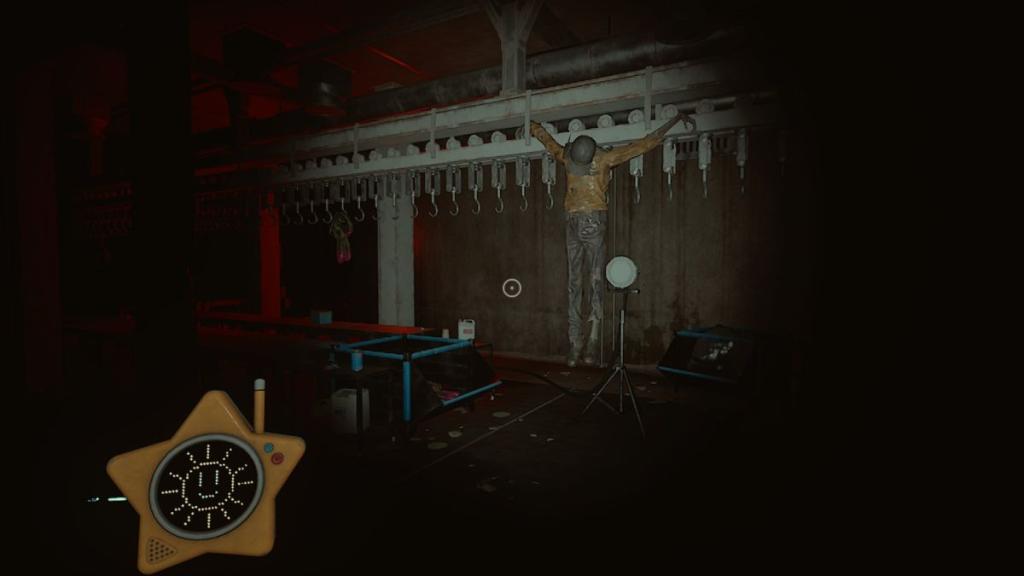 A hanging body on meat hooks in dark Poppy Playtime room