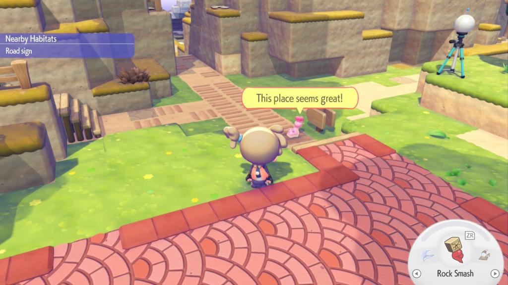 A pink Shellos looks at a signpost and says "This place seems great!"