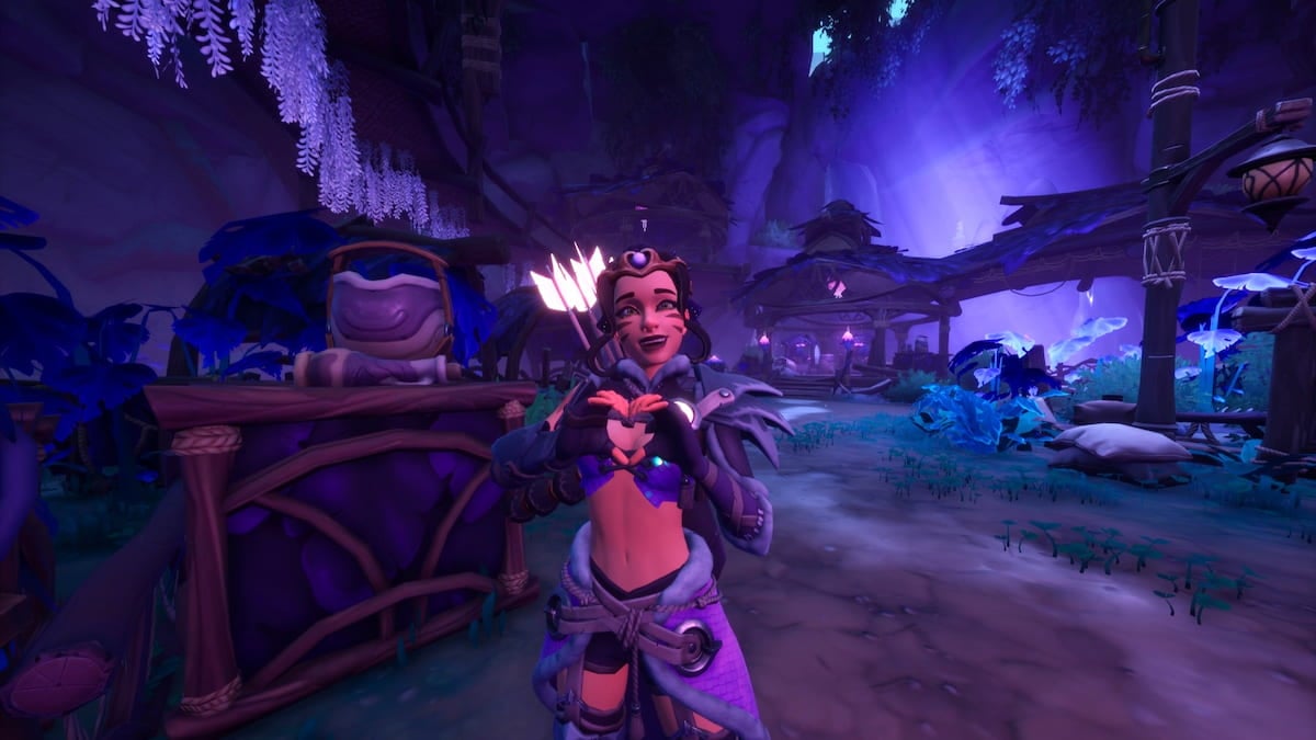 Palia player standing in dark, shadowy, purple elderwood region holding up hands in a heart