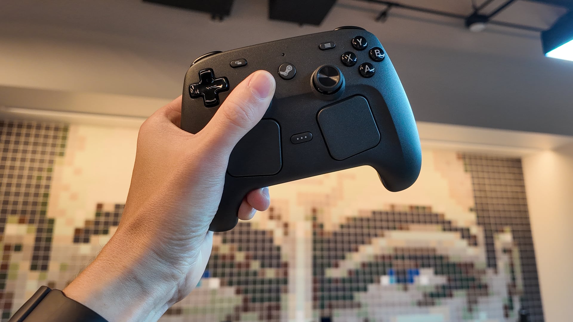 Steam Controller in a player's hands