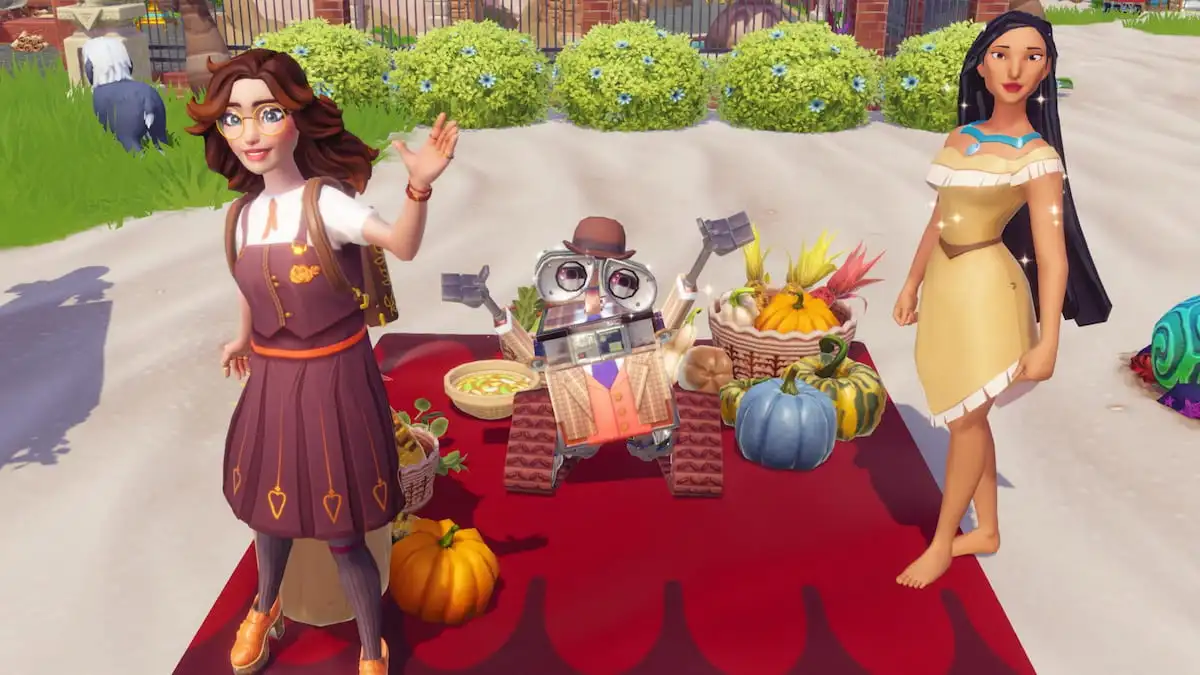 Player at a picnic with pocahontas and wall-e in disney dreamlight valley
