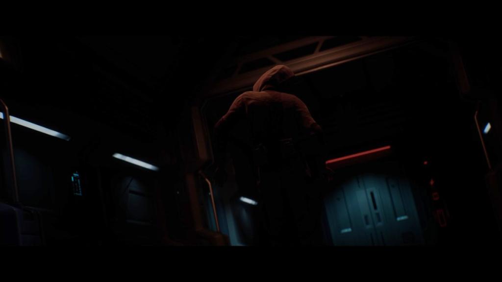 Back of hooded Simms with strange body language